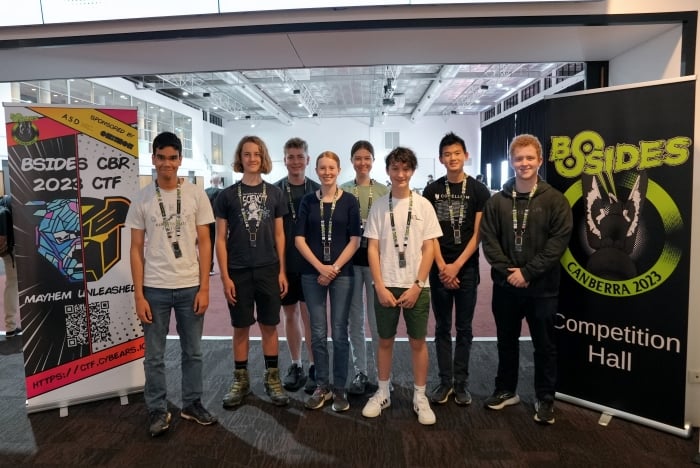 Picture of a student holding a camera rig.